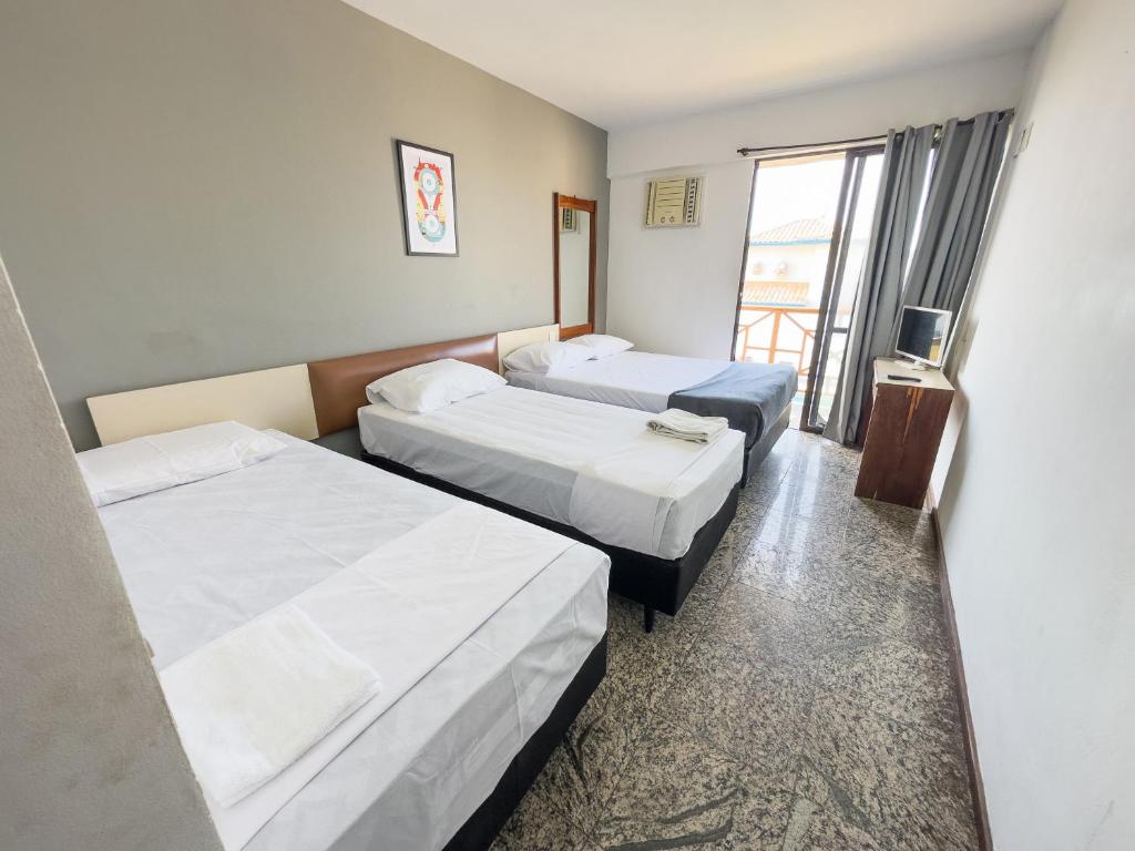 Quarto Quádruplo com Vista do Mar